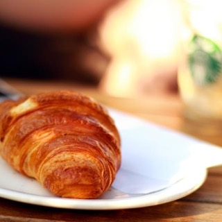 A croissant on a plate